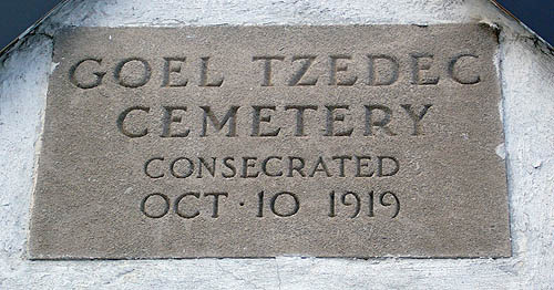 Plaque reads GOEL TZEDEC CEMETERY CONSECRATED OCT·10 1919